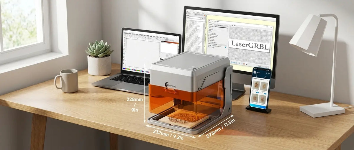 Laser engraver beside design software shown on computer and mobile screens